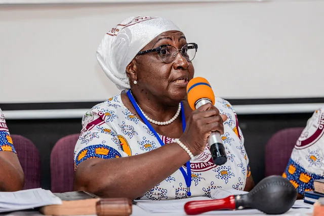 Op. Abigail Esi Gwira speaking into a microphone during the CLB conference.